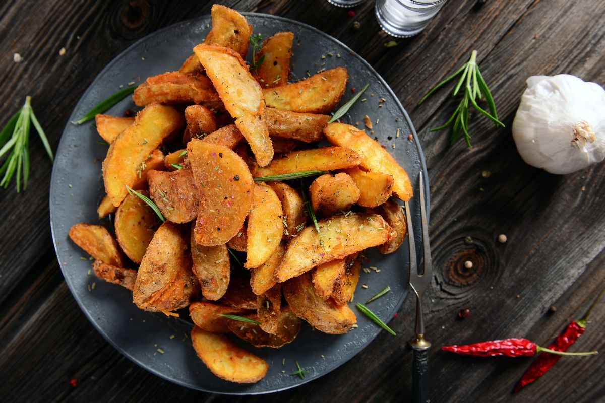 Grilled Potato Wedges with Hot Garlic, Red Chili, Parmesan & Parsley